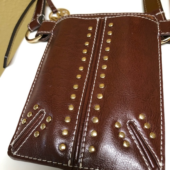 MICHAEL Michael Kors Handbags - NWOT. Michael Kors Studded Saddle Bag